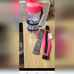 Victoria Secret Pink water bottle with accessories.